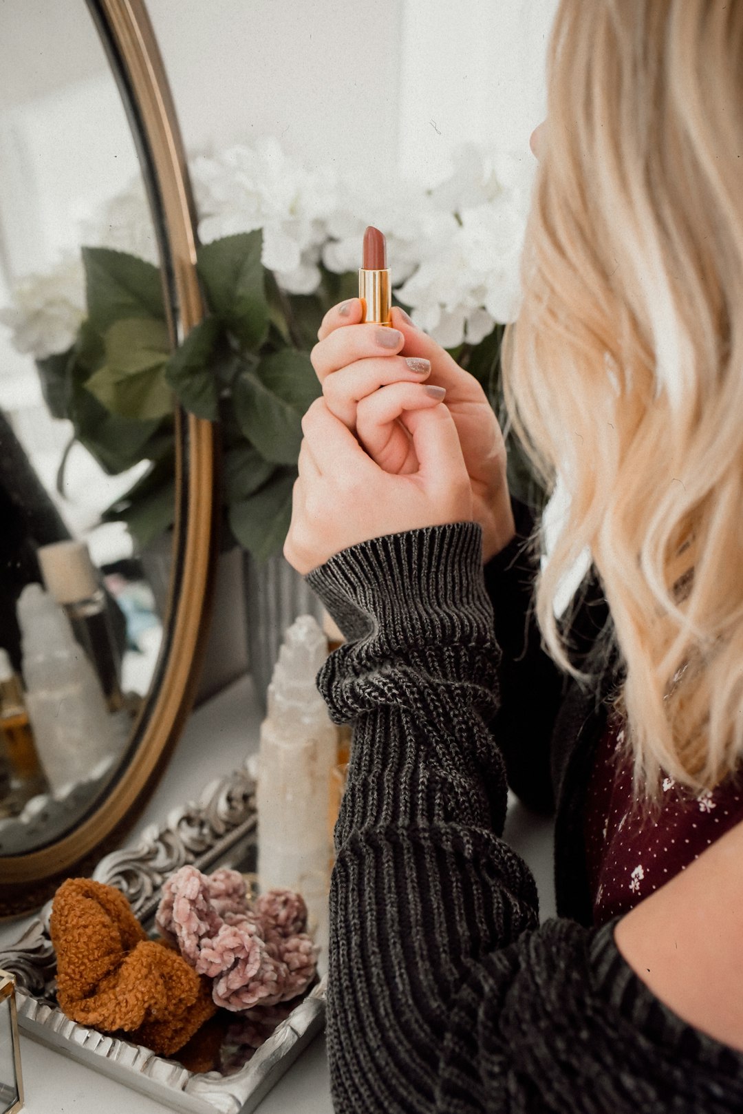 woman in black and white striped long sleeve shirt holding cigarette stick woman in black and white striped long sleeve shirt holding cigarette stick